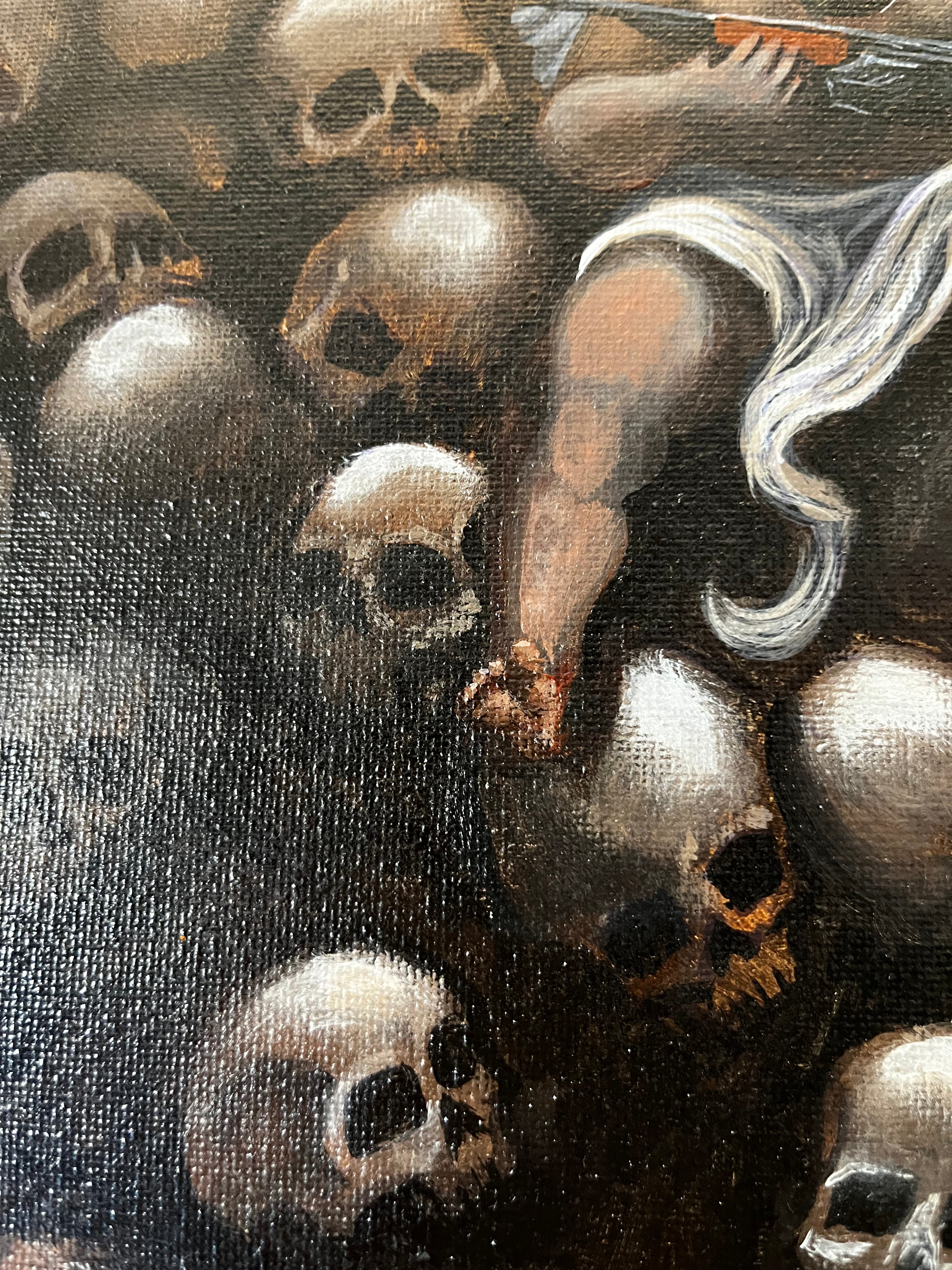 Love holds rifle on pile of skulls